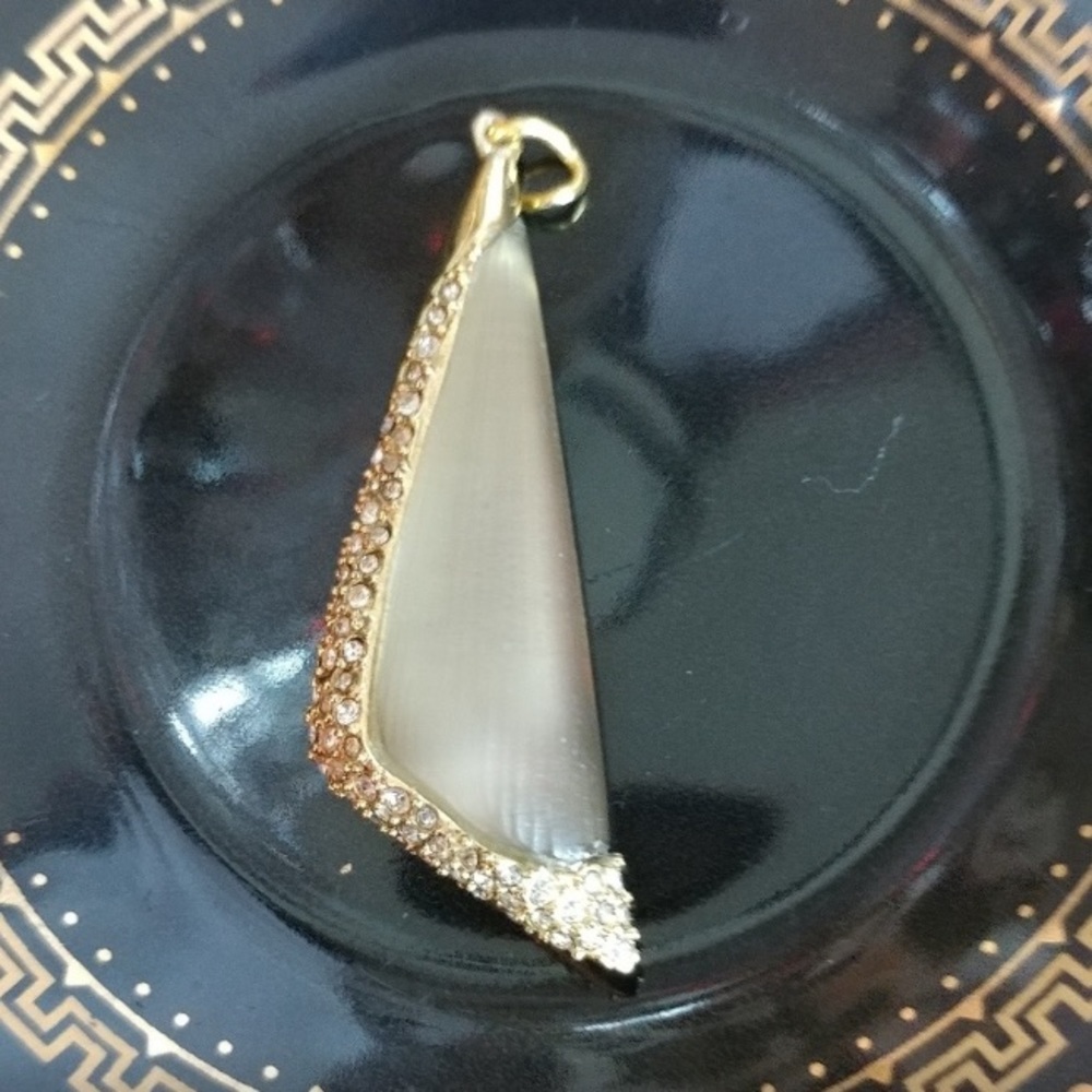 ALEXIS BITTAR Pendant in champagne color lucite & crystals in gold tone setting